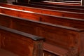 empty old and wooden church pews without people Royalty Free Stock Photo