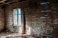 Empty old wooden room in an abandoned building. Window light is shining in. Abandoned Attic in Old House.View from the inside Royalty Free Stock Photo