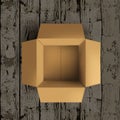 Empty Open Cardboard Box On Wooden Floor Royalty Free Stock Photo
