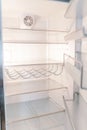 Empty open fridge with shelves Royalty Free Stock Photo