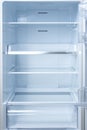 Empty open fridge with shelves, refrigerator. mockup background empty shelves for your products Royalty Free Stock Photo