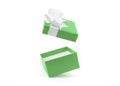 Empty open green color gift box with white ribbon bow isolated on white background lid is floating in the air Royalty Free Stock Photo