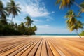 Empty orange bamboo table top stands for display product against the defocused white sand beach surrounded with coconut trees and Royalty Free Stock Photo