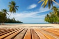 Empty orange bamboo table top stands for display product against the defocused white sand beach surrounded with coconut trees and Royalty Free Stock Photo