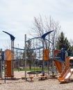 Empty Orange and Blue Playground Equipment During Pandemic