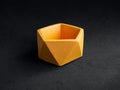 Empty orange pentagon shape concrete planter. Handmade cement pot for home decoration