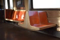 Empty Orange Seats, Riding on the New York Subway Train Royalty Free Stock Photo