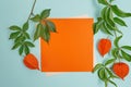 Empty orange sheet of paper flat lay mockup for your art, picture or hand lettering composition copy space, top view Royalty Free Stock Photo