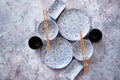 Empty oriental style dishware set on gray stone background