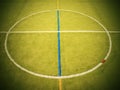 Empty outdoor handball playground, plastic light green surface on ground and white blue bounds lines. Royalty Free Stock Photo
