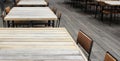 Empty outdoor old vintage wood table and chair in coffee shop restaurant Royalty Free Stock Photo