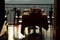 Empty outdoor restaurant table at sunset