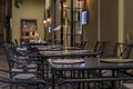 Empty outdoor tables at an Italian restaurant in Centro Storico, Florence, Italy Royalty Free Stock Photo