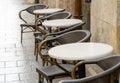 Empty outdoors bar, restaurant, cafe, elegant dining establishment area exterior simple detail, chairs and tables outside Royalty Free Stock Photo