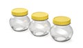 Empty oval glass jars with yellow plastic lids
