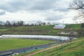 Empty oval sports stadium with running tracks. Russian flag and Royalty Free Stock Photo