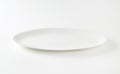 Empty oval white plate Royalty Free Stock Photo