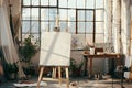 Empty Painting studio, art studio at loft apartment, cozy workplace mockup, clear canvas on easel Royalty Free Stock Photo