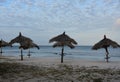 Empty Palapas in the Early Morning Hours on a Beach Royalty Free Stock Photo