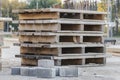 Empty pallets at a construction site. Reuse of wooden pallets in construction