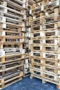 Empty pallets stacked in a warehouse