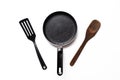 Empty pan on white background. Fried pan with spatula Royalty Free Stock Photo
