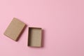 empty paper box with lid on pink background Royalty Free Stock Photo