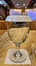 empty paper-covered glass cup on conference table