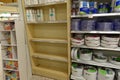 Empty paper cup display shelves at a Publix grocery store due to the people panicking and hoarding paper and food products Royalty Free Stock Photo