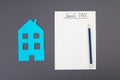 Empty paper, pen, house, goals for 2022, making plans, home buyer Royalty Free Stock Photo