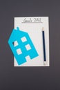 Empty paper, pen, house, goals for 2022, making plans, home buyer Royalty Free Stock Photo