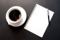 Empty paper sheet , cup coffee and pen on Black background, paper note for add text message