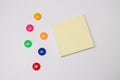 Empty paper sheet on white fridge door and Multicolored stationery magnets. Paper sheet on refrigerator door with Royalty Free Stock Photo