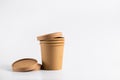 Empty paper soup cup on a white background. Brown food container for ice cream, noodles or other dishes. ecological product that Royalty Free Stock Photo