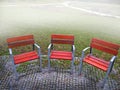 Empty park banches and seats in November. Royalty Free Stock Photo