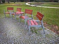 Empty park banches and seats in November. Royalty Free Stock Photo