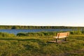 Empty Park Bench with Evening Light in front of the St-Lawrence Seaway