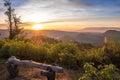 Empty park bench in high mountains Royalty Free Stock Photo