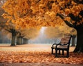 an empty park bench surrounded by fallen leaves