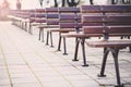 Empty park benches rows in front of an open air stage. Bulgaria, Bourgas, Sea Garden. Royalty Free Stock Photo