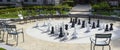 Empty park with big chess figures and empty chairs on background.Nobody playing in games.Banner. Royalty Free Stock Photo