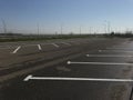 Empty parking area near highway