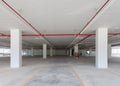 Empty parking garage underground interior in apartment or business building office. Royalty Free Stock Photo