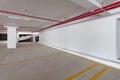 Empty parking garage underground interior in apartment or business building office. Royalty Free Stock Photo