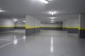 Empty parking garage underground interior in apartment Royalty Free Stock Photo