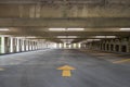 Empty parking garage with a straight arrow. Royalty Free Stock Photo