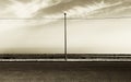 Empty parking with lamppost, sepia hue