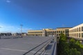 Empty parking lot with trees and office building Royalty Free Stock Photo