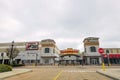 Empty parking lot in front of a Cinemark Movie Theater and an Applebee`s Restaurant during the COVID-19 shutdown. Royalty Free Stock Photo