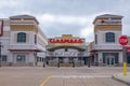 Empty parking lot in front of a Cinemark Movie Theater and an Applebee`s Restaurant during the COVID-19 shutdown.